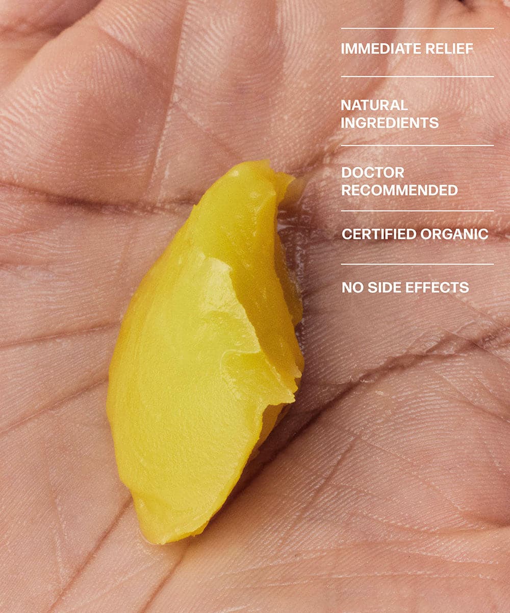 A person's hand is holding a VMAGIC® Lichen Sclerosus Care - PREORDER Ships 1/17/24 by Medicine Mama.