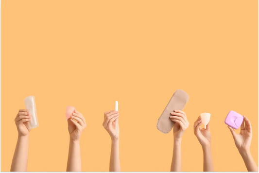 A woman hands with different types of Feminine Hygiene Products for Odor
