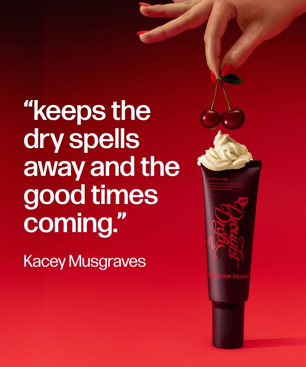 A hand holds two cherries above a tube of Drought Drops water-based personal lubricant topped with whipped cream. The background is red. Text reads: keeps the dry spells away and the good times coming. Kacey Musgraves.