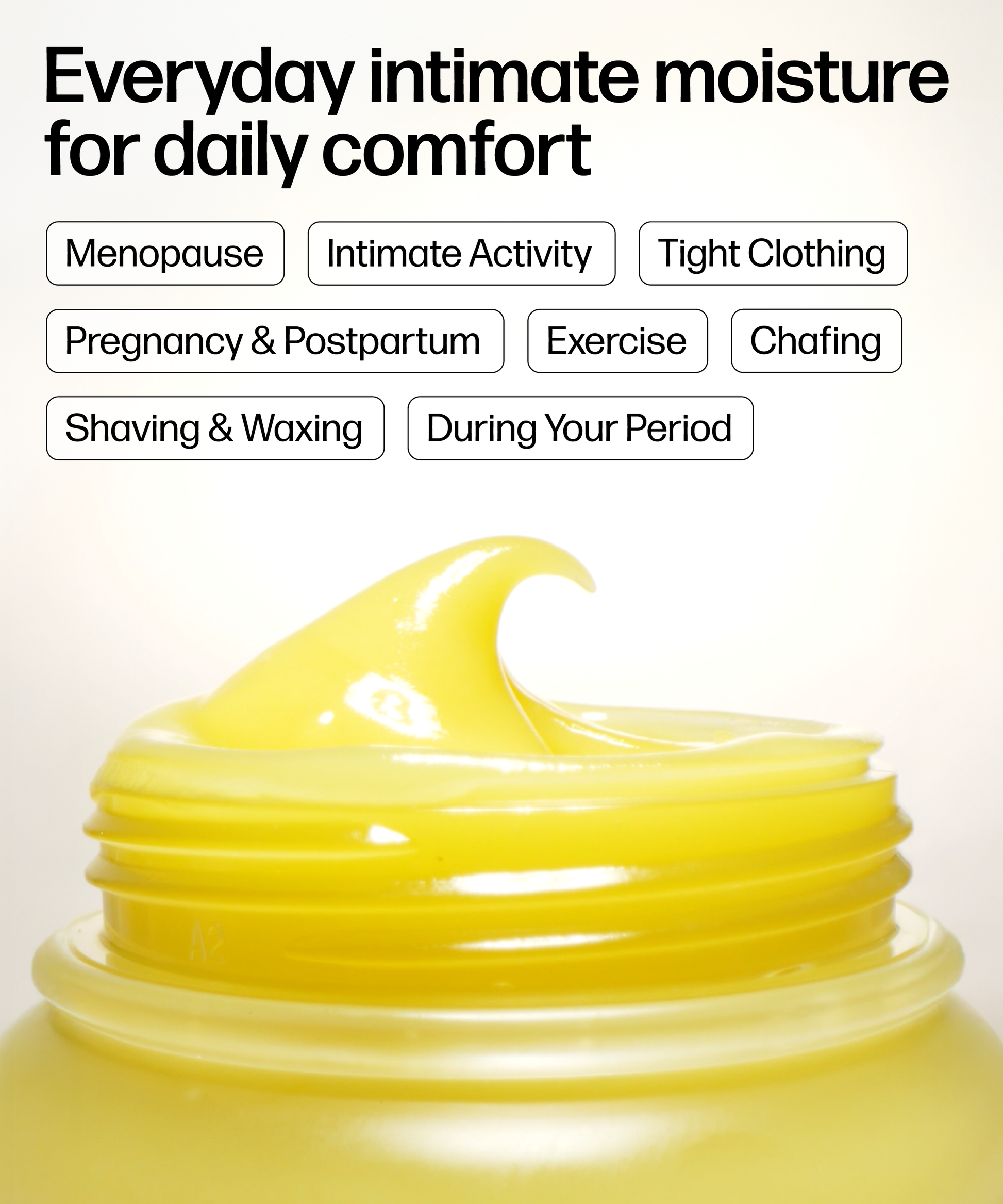 A close-up of VMAGIC® Vulva Balm, a yellow, creamy, hormone-free moisturizer in an open jar with text above for uses: menopause, intimacy, tight clothing, pregnancy & postpartum, exercise, chafing, shaving & waxing, and periods.