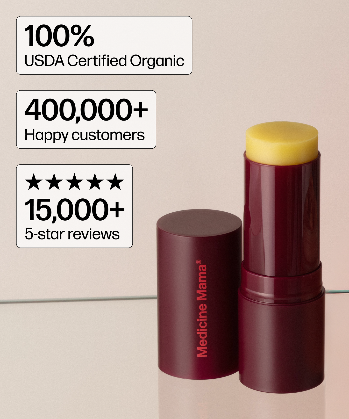 A maroon tube of VMAGIC® Lips Stick with the lid off, revealing yellow balm. Text highlights “100% USDA Certified Organic,” “400,000+ happy customers,” and “15,000+ 5-star reviews.”.